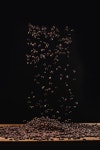 피 아이 엘(PIL)로스터리 | 유토이미지 | roasted coffee beans in pile and in air isolated on black