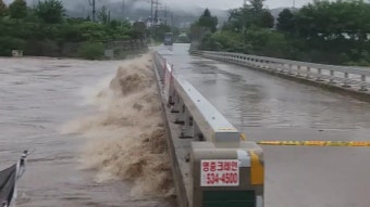 [사회]경기 북부 '물폭탄'...잠기고 휩쓸리고 | YTN 경기 북부 '물폭탄'...잠기고 휩쓸리고