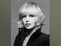 Presenting a few photographs of actress Charlize Theron.  She was born in South Africa in August 7, 1975 of German and French... 