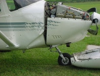 21 Jul 02, C-182R, Runway 35, wind 030/09 Training while returning from SAREX Pilot flying an ILS under the hood - CFI was safety... 