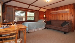 1 Bedroom, 1 Bathroom,  Living room with twin day bed, Kitchenette Deck in Rockport | Best Rates & Deals on Orbitz