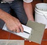 Man grouting ceramic tile 이미지 (96190469) - 게티이미지뱅크 96190469 - 게티이미지뱅크