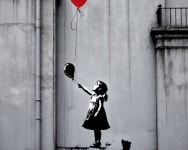 Images of Banksy girl throwing Judo fighter graffiti on the old city wall. | Deep Dream Generator