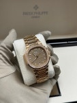 Patek Philippe 7118/12000r Champaign Dial Nautilus for $175,000 for sale from a Trusted Seller on Chrono24