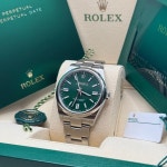 Rolex Oyster Perpetual 41 Green Dial Stainless Steel Smooth... for $10,995 for sale from a Trusted Seller on Chrono24