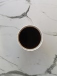 Premium Photo | A cup of coffee on the table