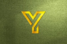 곡물 질감 배경에 황금 로고 이랑 | 프리미엄 PSD 파일