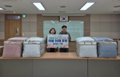 만수1동 지역주민, 이웃사랑 실천을 위한 이불 50채 전달 | 뉴스로