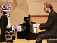 감성 연주 vs 정확한 연주…인간-로봇 피아노 배틀 | 연합뉴스