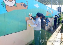 강원농협, 춘천 한우 농장서 축산환경 개선 활동 | 연합뉴스