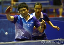 <올림픽> 탁구 이정우.문현정 `아름다운 조연