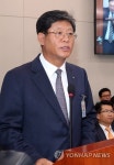 업무보고하는 김재홍 대한무역투자진흥공사 사장 | 연합뉴스