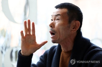 인터뷰하는 손웅정 감독 | 연합뉴스