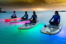 2024 Night SUP Yoga in Honolulu, Hawaii provided by Yoga Floats