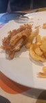 Black chips - not very premier Id say. Shame, this used to be a good chippy. - Picture of Budleigh Fish Café, Budleigh... 