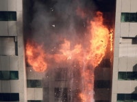 Video: Woman Braves Raging Apartment Fire to Save Two Dogs