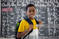 아이더해남점 | First Day Of School Stock Photo | Getty Images An elementary age schoolboy is standing at the front of the classroom...