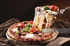 Pizza Stock Photo | Getty Images Pizza with melted cheese