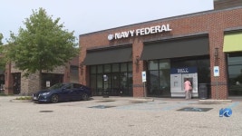 Two charged in relation to bank robbery-turned-police shooting