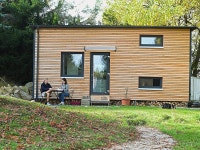 Tiny houses are getting more expensive, and owners are struggling to afford them. But one expert says the price hikes are great... 
