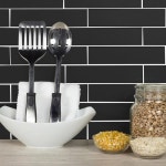 Write a Review about Abolos Metro 40-Pack Black 3-in x 12-in Glass Wall Tile (Common: 3-in x 12-in; Actual: 3-in x 12-in) at... 