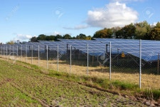 Generating Clean Energy With Solar Modules In A Big Park In Northern Europe. 로열티 무료 사진, 그림, 이미지 그리고... 