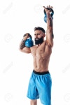 Muscular Shirtless Tattooed Bearded Male Athlete Bodybuilder Workout With Kettlebell On A White Background. Isolate 로열티 무료... 