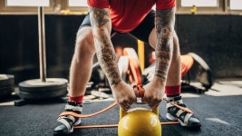 The Gym Hack That Turns Your Squats Into a Full-Body Power Move