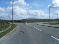 A30 westbound exit slip at roundabout © Colin Pyle cc-by-sa/2.0 :: Geograph Britain and Ireland A30 westbound exit slip at... 