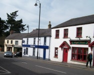 Bank and shops on the corner of... © Eric Jones :: Geograph Britain and Ireland Bank and shops on the corner of... &copy; Eric Jones