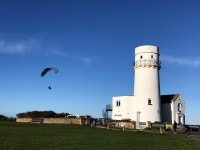 Paraglider near Hunstanton lighthouse © Richard Humphrey cc-by-sa/2.0 :: Geograph Britain and Ireland Paraglider near Hunstanton... 
