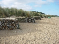 Rock gabions protecting dunes © Hugh Venables cc-by-sa/2.0 :: Geograph Britain and Ireland Rock gabions protecting dunes... 