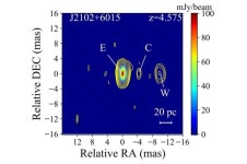 Radio source J2102+6015 investigated in detail