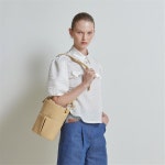 [라이] LIE 트윈클 버튼 블라우스 화이트 - 주식회사 패션지오 [라이] LIE 트윈클 버튼 블라우스 화이트