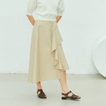 [니어앤디어] Flare asymmetric long skirt_BE - 주식회사 서울쇼룸 [니어앤디어] Flare asymmetric long skirt_BE