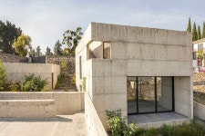 three concrete boxes form house colibri by ViGa arquitectos in mexico city