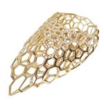 Zaha Hadid creates rings from gold lattices for Caspita