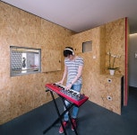 TallerDE2 uses OSB to create adaptable Madrid apartment