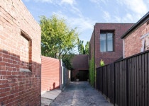 B.E. Architecture completes three brick houses for a family B.E. Architecture completes a trio of red brick houses for the same... 