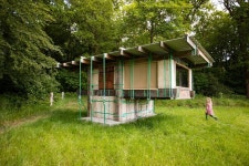 Overtreders W secures hotel cabin with colourful straps Overtreders W constructs hotel cabin from locally sourced materials... 