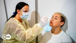 Global COVID-19 cases surge past 250 million – DW – 11/09/2021