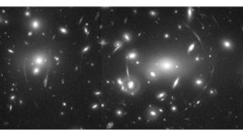 Distant Galaxies of Abell 2218 Viewed Through a Cosmic Lens | HubbleSite Distant Galaxies of Abell 2218 Viewed Through a Cosmic Lens