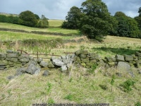 Broken wall next to Hebden Royd FP17 © Humphrey Bolton cc-by-sa/2.0 :: Geograph Britain and Ireland Broken wall next to  Hebden... 
