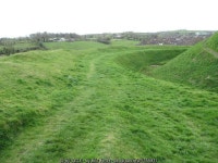 Banks and deep ditch surrounding the... © Eric Jones :: Geograph Britain and Ireland Banks and deep ditch surrounding the...... 