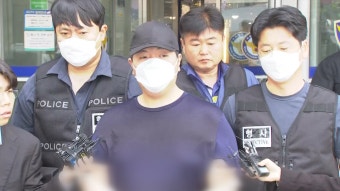 '미아동 살인사건' 김성진 송치...취재진 질문엔 