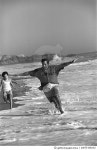 a0075-000142 | 게티이미지코리아 | Man and Children on Beach Royalty-Free 이미지