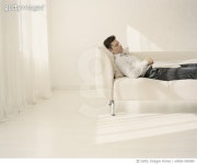 a0083-000085 | 게티이미지코리아 | Man Sleeping on Sofa Royalty-Free 이미지