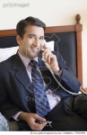 79526986 | 게티이미지코리아 | Portrait of a businessman talking on the telephone and smiling Royalty-Free 이미지