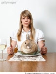93909816 | 게티이미지코리아 | Woman with living rabbit on her plate Royalty-Free 이미지