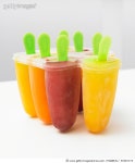 90545774 | 게티이미지코리아 | Homemade fruit ice lollies, close up Royalty-Free 이미지
